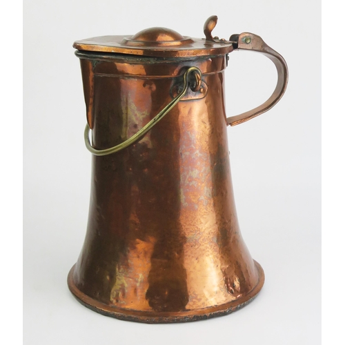 179 - A 19th century copper water jug and cover, of cylindrical tapering form, with loop carrying handle h... 