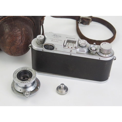 198 - A Leica III B camera, fitted with Leitz Elmar 1:3,5F=50mm lens, serial No 265080, in leather case, t... 