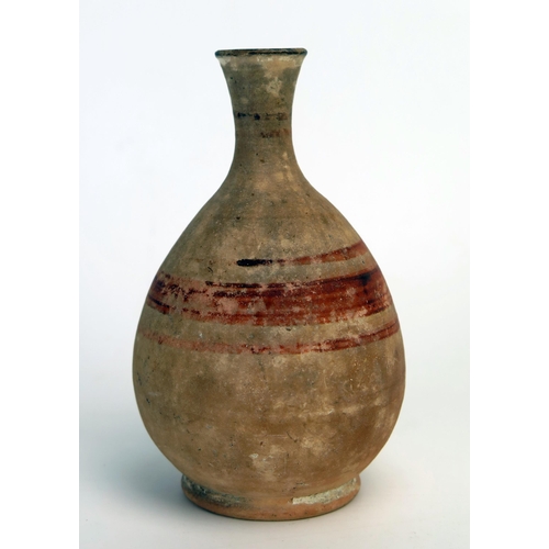 208 - An ancient Cyprian vase, of ovoid form with short flared neck and spout, with banded decoration, on ... 