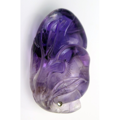 209 - A Chinese carved amethyst pendant in the form of a gourd and bat, 4cm long.