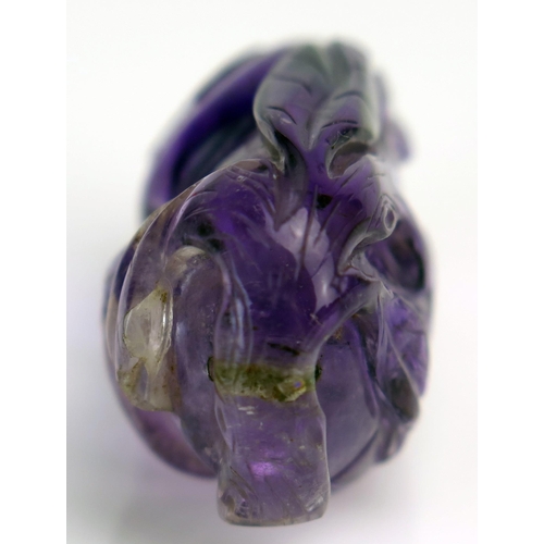 209 - A Chinese carved amethyst pendant in the form of a gourd and bat, 4cm long.