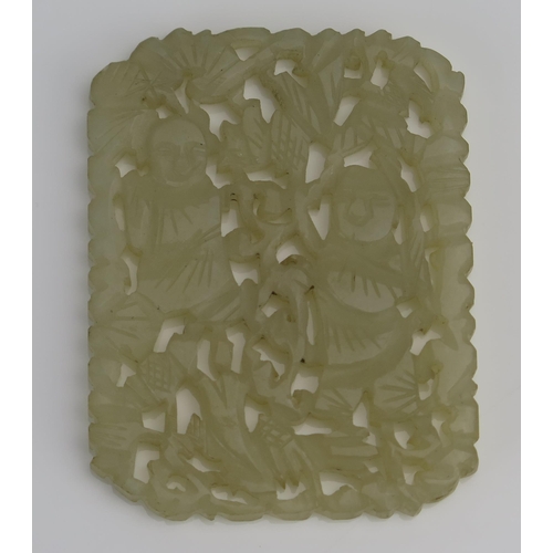 211 - A Chinese carved jade pendant of rectangular outline, with pierced decoration of figures amongst fol... 