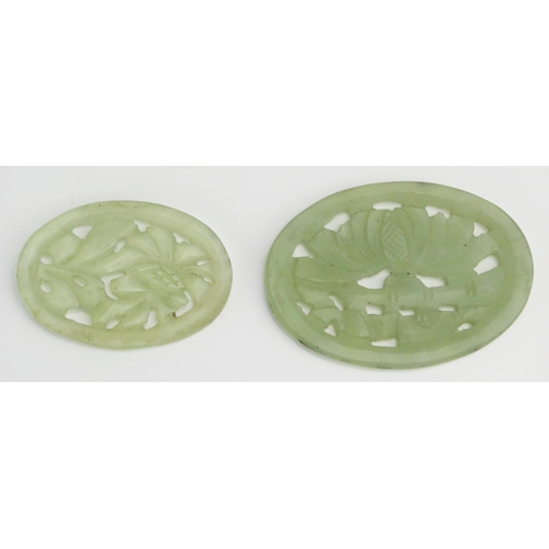 212 - A Chinese carved jade floral medallion of oval outline 6.5cm wide together with a smaller example 5c... 