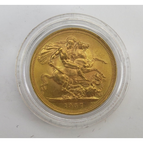 219 - * An Elizabeth II 1957 Gold Sovereign in a later London Mint Office presentation case with certifica... 