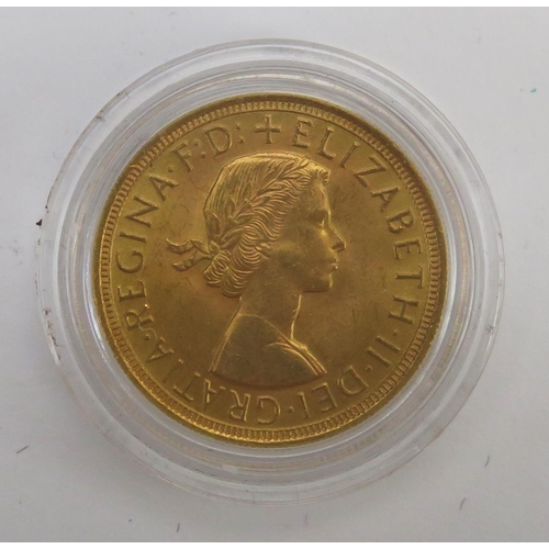 219 - * An Elizabeth II 1957 Gold Sovereign in a later London Mint Office presentation case with certifica... 