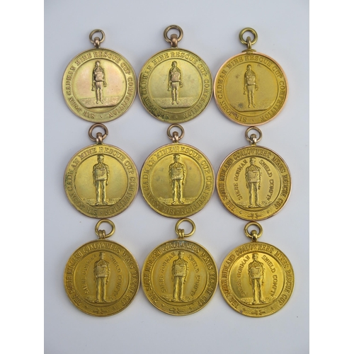 247 - Of Mining and Military Interest _ Nine 9ct Gold Mines Rescue Cup Medallions awarded to Joshua Payton... 