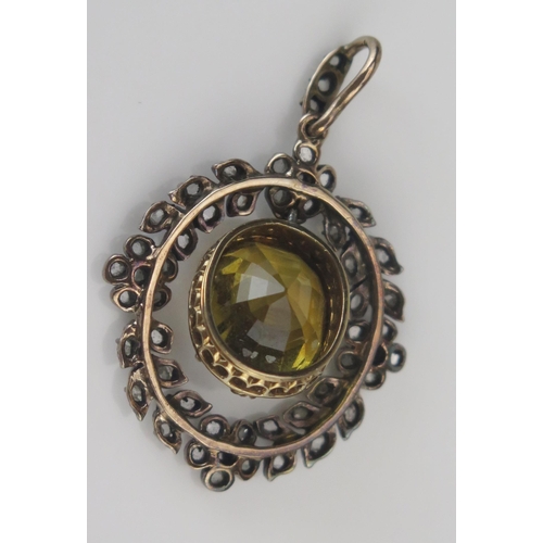 26 - An Antique Yellow Topaz and Rose Cut Diamond Wreath Pendant in a precious yellow and white metal set... 