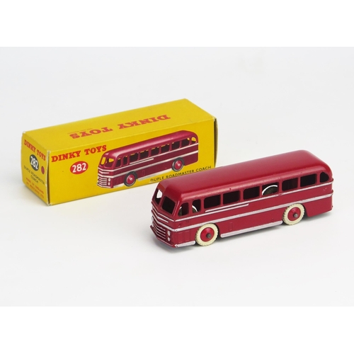 270 - Dinky 282 (29H) Duple Roadmaster Leyland Royal Tiger Coach in red with silver stripes, red ridged hu... 