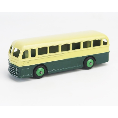 272 - Dinky 29H (282) Duple Roadmaster Leyland Royal Tiger Coach in cream/dark green with green ridged hub... 