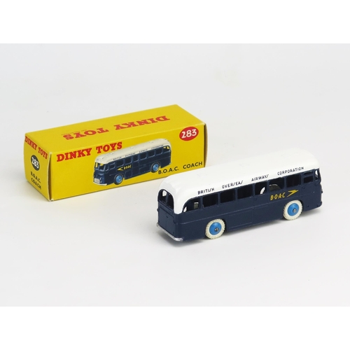 275 - Dinky 283 BOAC Coach in dark blue, white roof and treaded tyres, blue ridged hubs - mint or very nea... 