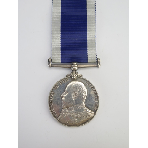 310 - An Edward VII  Royal Navy Long Service & Good Conduct Medal to Charles Rushton. C.P.O. H.M.S. Karrak... 