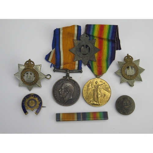 313 - A World War I Pair to 24637. Pte. J Felton. Devon R., War and Victory Medals together with cap badge... 