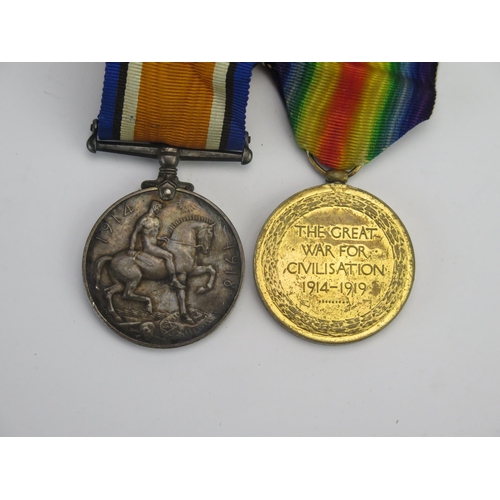 313 - A World War I Pair to 24637. Pte. J Felton. Devon R., War and Victory Medals together with cap badge... 