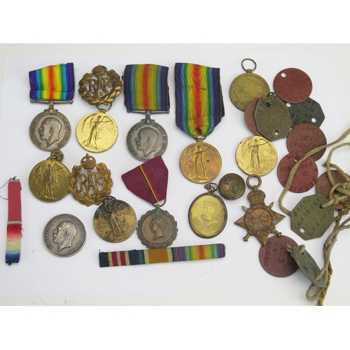 317 - A collection of World War I War and Victory Medals 1914-15 Star, identity tags, ribbons, RAF cap bad... 