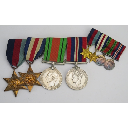 318 - A World War II group of four medals, includes 1939-45 Star, France Germany Star, Defence and War Med... 