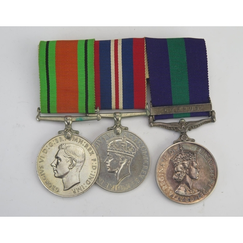 319 - A World War II medal group includes Defence Medal, War Medal and General Service Medal with Cyprus c... 