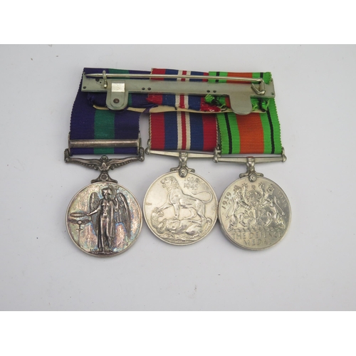 319 - A World War II medal group includes Defence Medal, War Medal and General Service Medal with Cyprus c... 