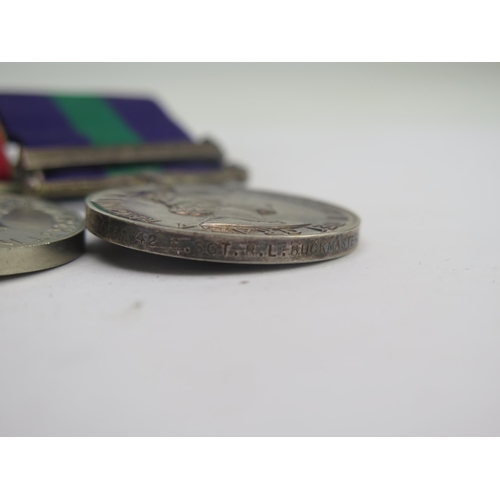 319 - A World War II medal group includes Defence Medal, War Medal and General Service Medal with Cyprus c... 