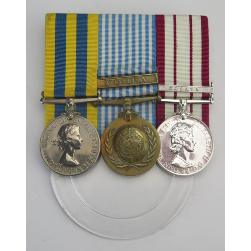 323 - A Korean trio to P/SXX830853. R. F. Butler. A.B.R.N. with Korea clasp, Naval General Service Medal w... 