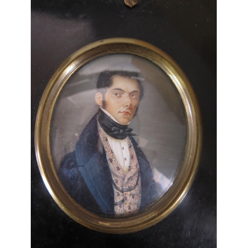 326 - A 19th century French School miniature portrait on ivory of a gentleman, with black cravat, embroide... 