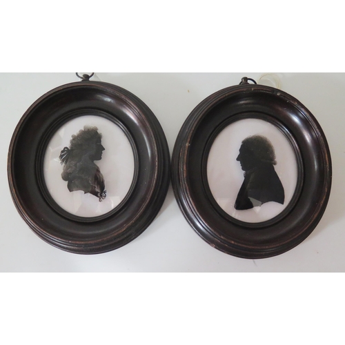 331 - Attributed to Isabella Beetham, two silhouettes reverse painted on glass, of a lady and gentleman, c... 