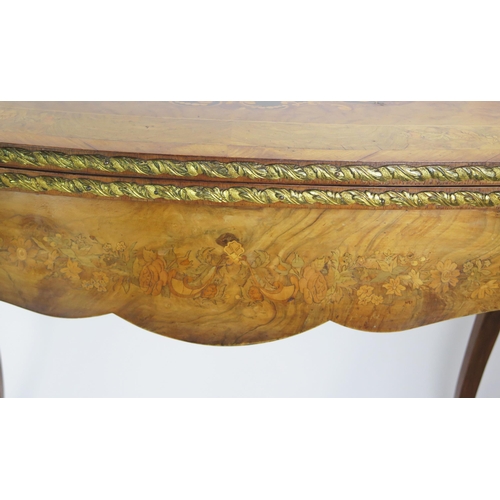 353 - A 19th century French walnut, marquetry and crossbanded card, of serpentine outline the hinged swive... 