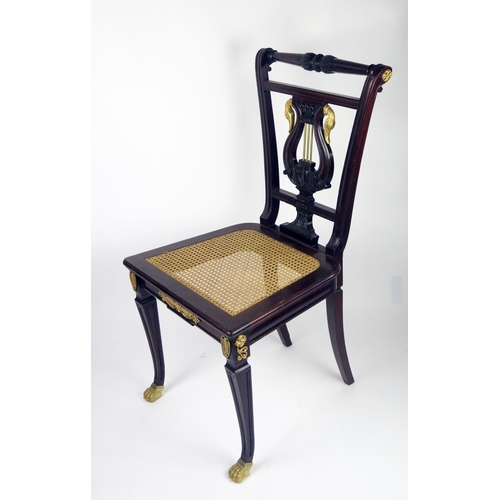 354 - A 19th century Empire style mahogany salon chair, the back of tapering form with turned top rail hav... 