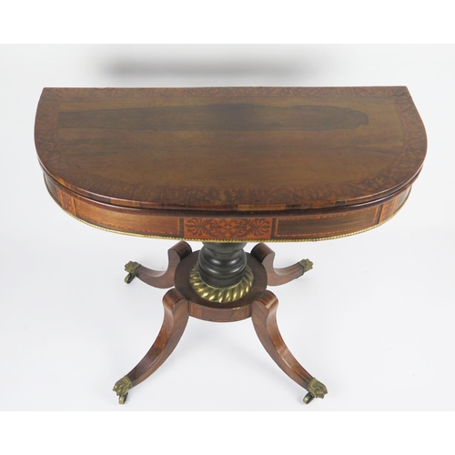 355 - A 19th century rosewood card table, the hinged crossbanded top of D-shaped outline with baize lined ... 