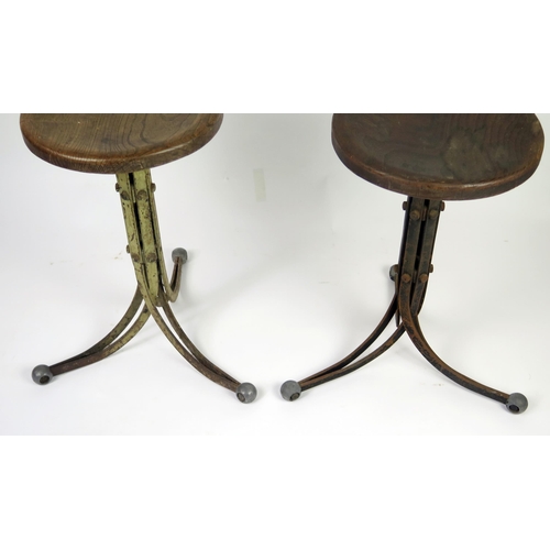 357 - A Near Pair Rubery Owens non-adjustable machinist's blade chairs, with single curved bar back and so... 