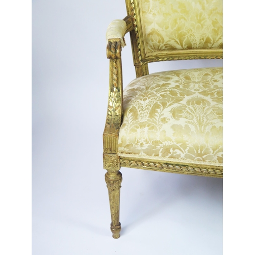 358 - A Louis XVI style part salon suite includes canapé and two side chairs, the canapé with curved top r... 