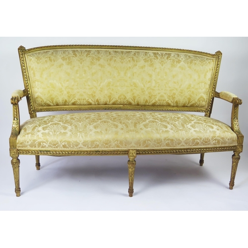 358 - A Louis XVI style part salon suite includes canapé and two side chairs, the canapé with curved top r... 