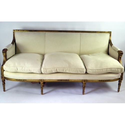 359 - A 19th century Louis XVI style gilt wood canapé, straight top rail and padded back, with padded scro... 