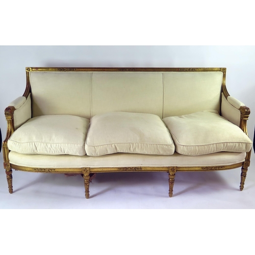 359 - A 19th century Louis XVI style gilt wood canapé, straight top rail and padded back, with padded scro... 