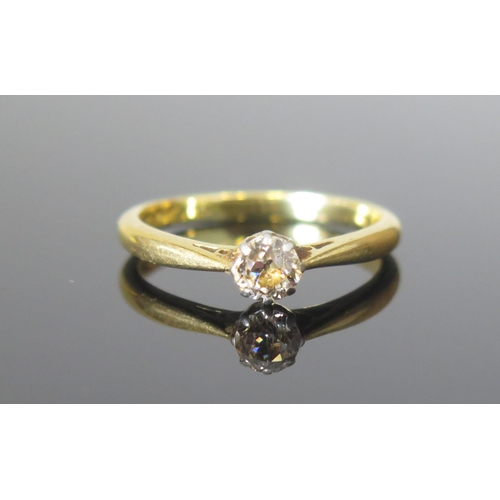 36 - A Modern 18ct Gold and Diamond Solitaire Ring platinum claw set c. 4.87mm old cut, size R.5, stamped... 