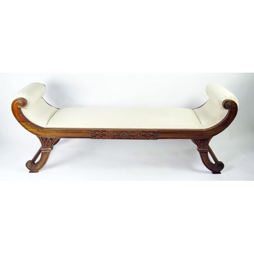 360 - A reproduction carved hardwood window seat in the regency taste, with padded scroll ends and padded ... 