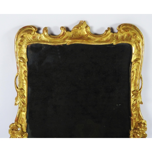 365 - A late 18th century gilt and gesso pier glass, the rectangular mirror plate enclosed by floral and f... 