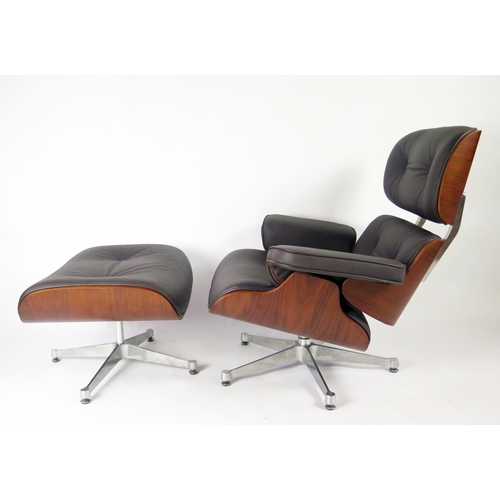 369 - An Eames style swivel armchair, with button down upholstered back and stuff over seat, with padded a... 