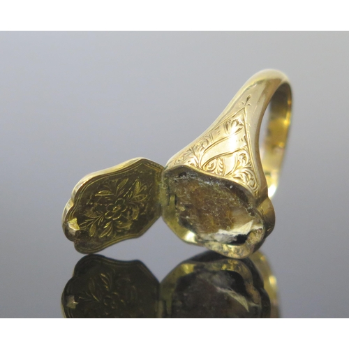 41 - A Victorian 15ct Gold 'Poison' Ring, the hinged top set with agate and opening to reveal a foliate c... 