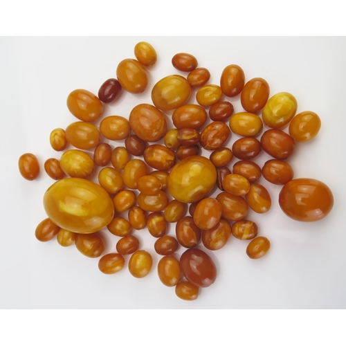 64 - A Quantity of Amber Graduated Loose Beads, largest 31x22.6mm, 58.79g