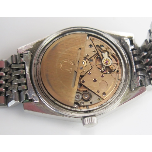 69 - An OMEGA Gent's Steel Cased Automatic Wristwatch, Ref: 166.0120 on a flat beads of rice bracelet, 34... 