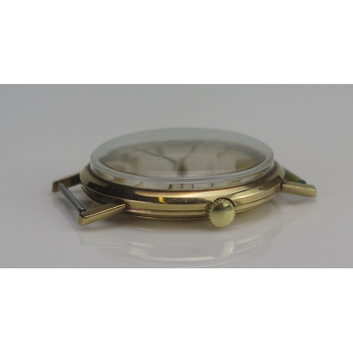 71 - An OMEGA Gent's 9K Gold Cased Manual Wind Wristwatch, 33.7mm case with date aperture to the dial, Re... 