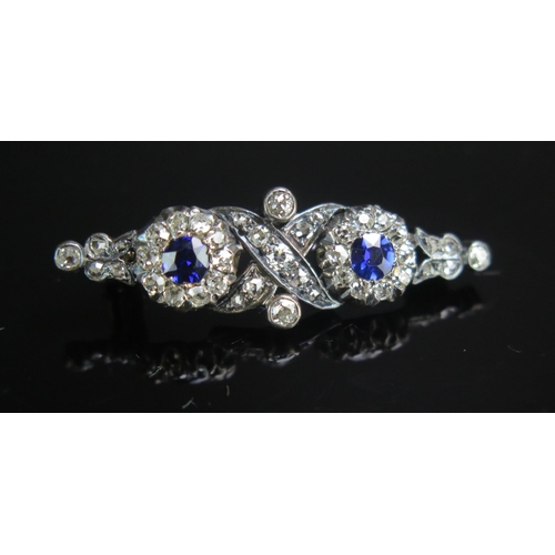 106 - An Antique Dark Blue Spinel and Diamond Brooch in a precious metal setting, 34.8mm, 3.45g