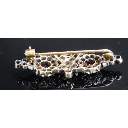 106 - An Antique Dark Blue Spinel and Diamond Brooch in a precious metal setting, 34.8mm, 3.45g