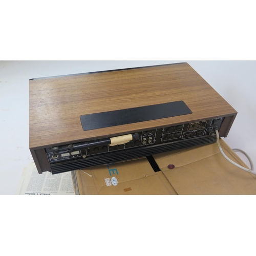 1068 - Rotel RX-802 AM/FM Stereo Receiver, teak cased with original box and owner's manual