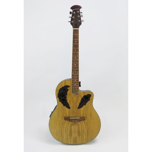 1076A - A Gear-4-Music six string electric acoustic guitar.