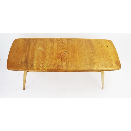 1135 - An Ercol Blonde Coffee Table with ,magazine rack below, 103x44cm