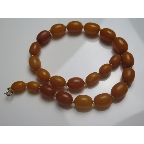 127 - A Graduated Amber Bead Necklace, largest bead c. 20.1x15.2mm, 17.75