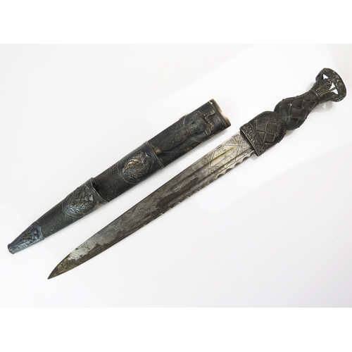 1567 - A Gordon Highlanders dirk, with 30cm fullered blade with etched regimental honours, Royal cypher and... 