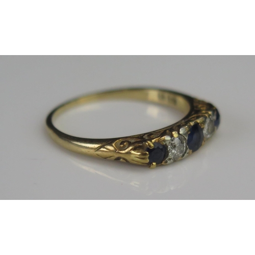 169 - An 18ct Gold, Sapphire and Old Cut Diamond Five Stone Ring, c. 3.4mm principal stone, size N.5, 2.74... 