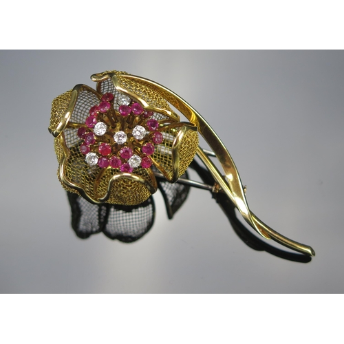 206 - A French 18ct Gold, Ruby and Diamond Articulated Flower Brooch, the mesh petals opening to reveal th... 